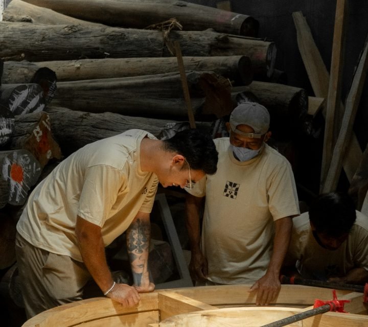 Arania team assembling a custom wooden piece together