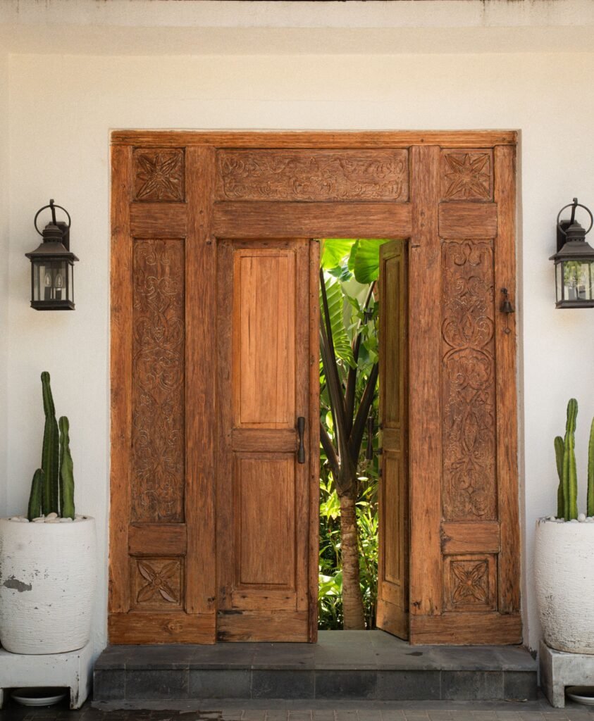 Hand-carved Javanese-style teak entrance door by Arania Bali