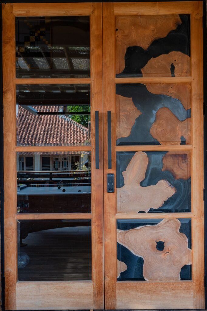 Custom teak double door with resin inlay panels by Arania Bali